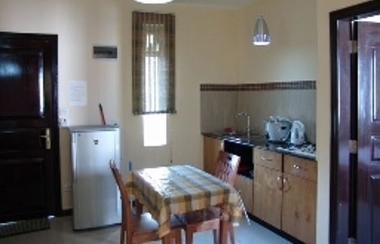 Küche im Zimmer Villa Narmada