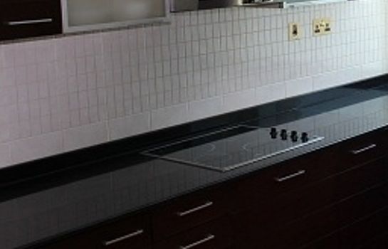 Kitchen in room Aparthotel Adagio Premium West Bay Doha